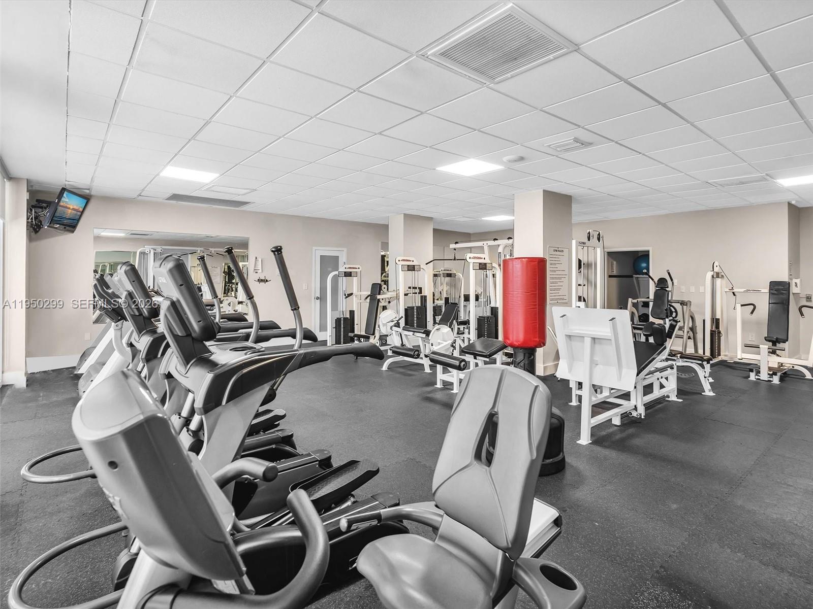 3140 South Ocean Drive, Unit 206 Hallandale Beach, FL 33009 - Photo 78 of 80 a view of a room with gym equipment