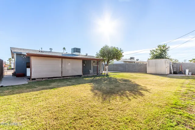 a view of a patio with furniture