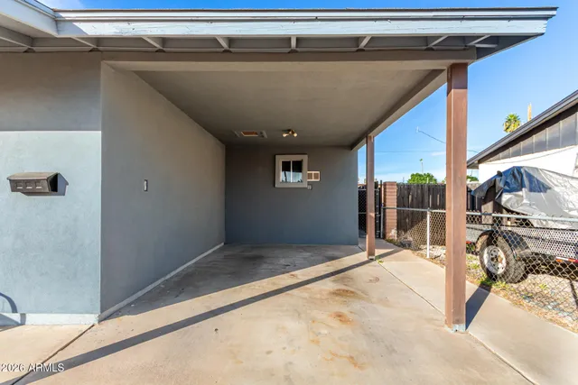 a view of a backyard of the house