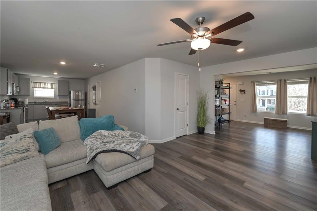 294 Muskogee Drive Dallas, GA 30132 - Photo 13 of 32 a living room with furniture and wooden floor