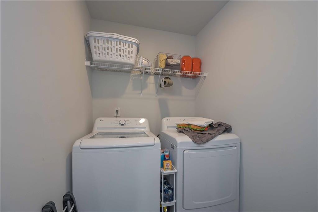294 Muskogee Drive Dallas, GA 30132 - Photo 23 of 32 a utility room with dryer and washer