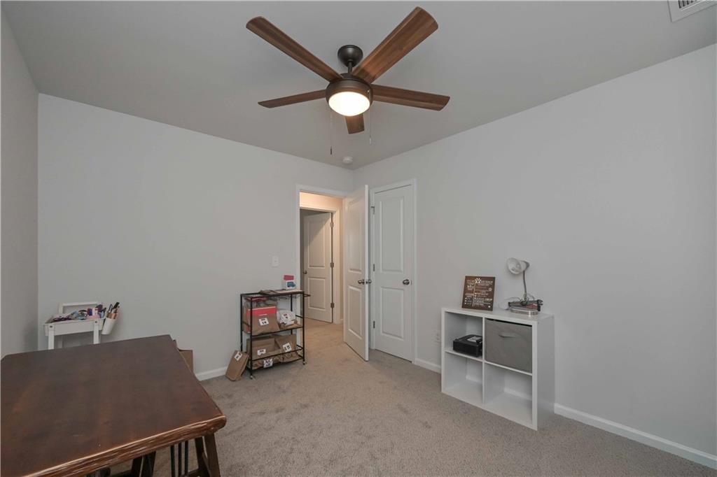 294 Muskogee Drive Dallas, GA 30132 - Photo 25 of 32 a living room with furniture