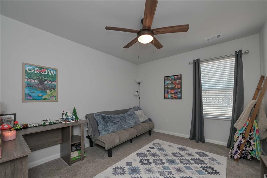 294 Muskogee Drive Dallas, GA 30132 - Photo 26 of 32 a living room with furniture and a window
