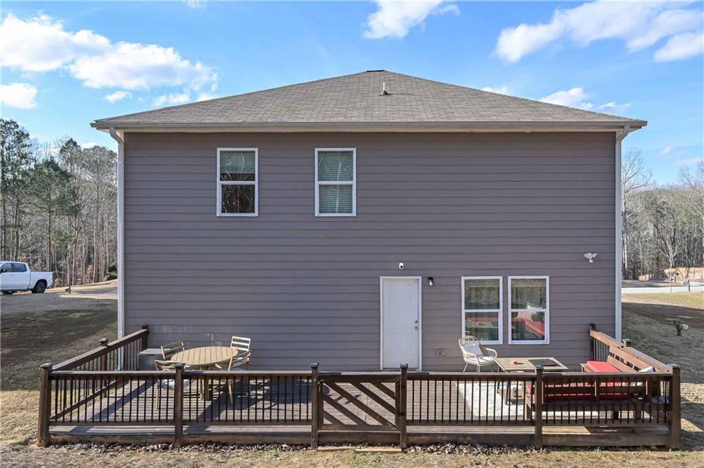 294 Muskogee Drive Dallas, GA 30132 - Photo 7 of 32 a front view of a house with a garden