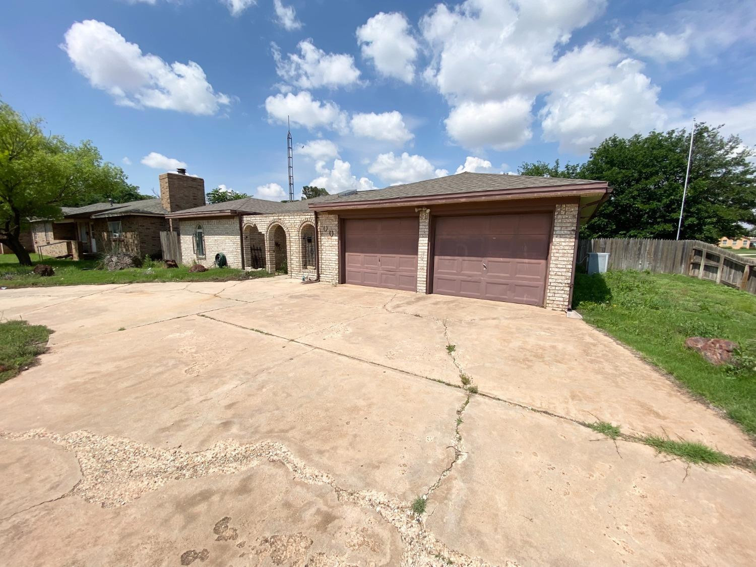 a house with yard in front of it