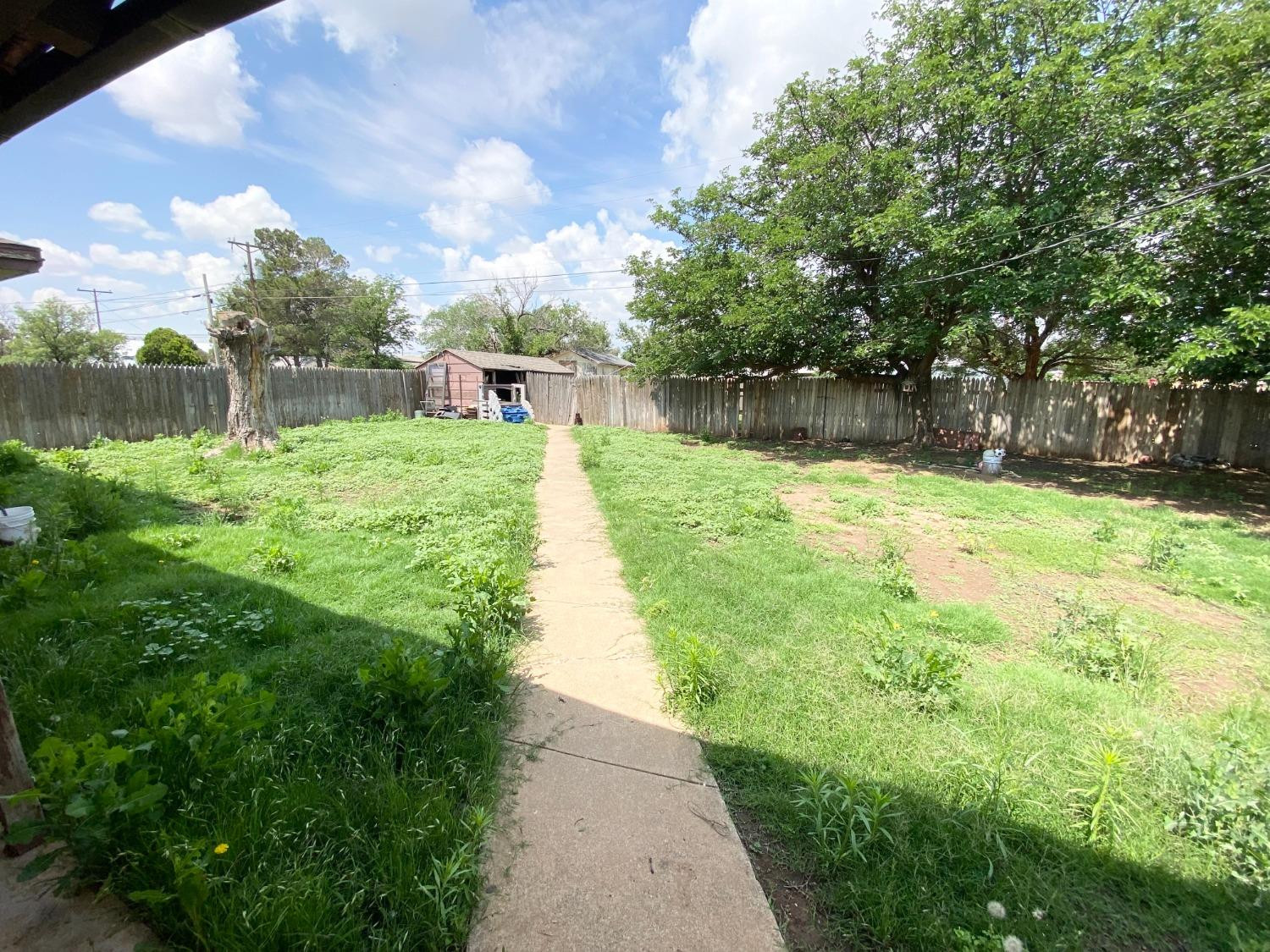 1311 Ave G Abernathy, TX 79311 - Photo 14 of 15 a view of a lake with a yard
