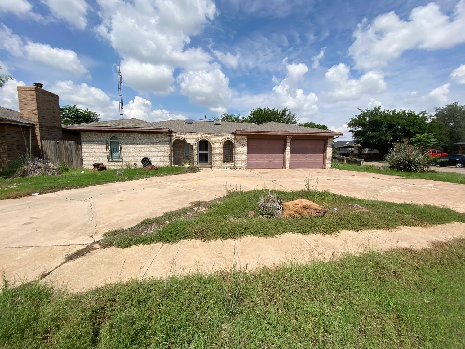 1311 Ave G Abernathy, TX 79311 - Photo 2 of 15 a view of a yard in front of a house