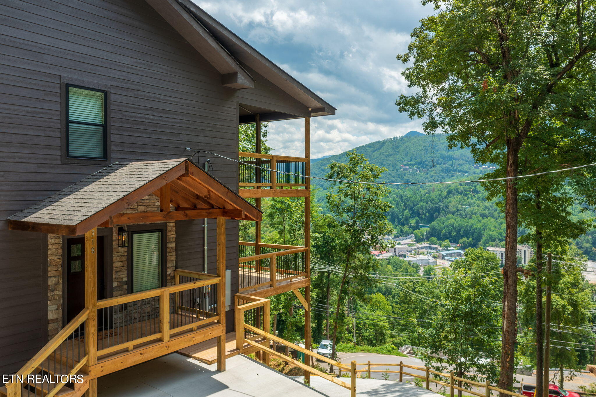 318 Greystone Heights Road Gatlinburg, TN 37738 - Photo 2 of 60 318 GSH Ext Side 1