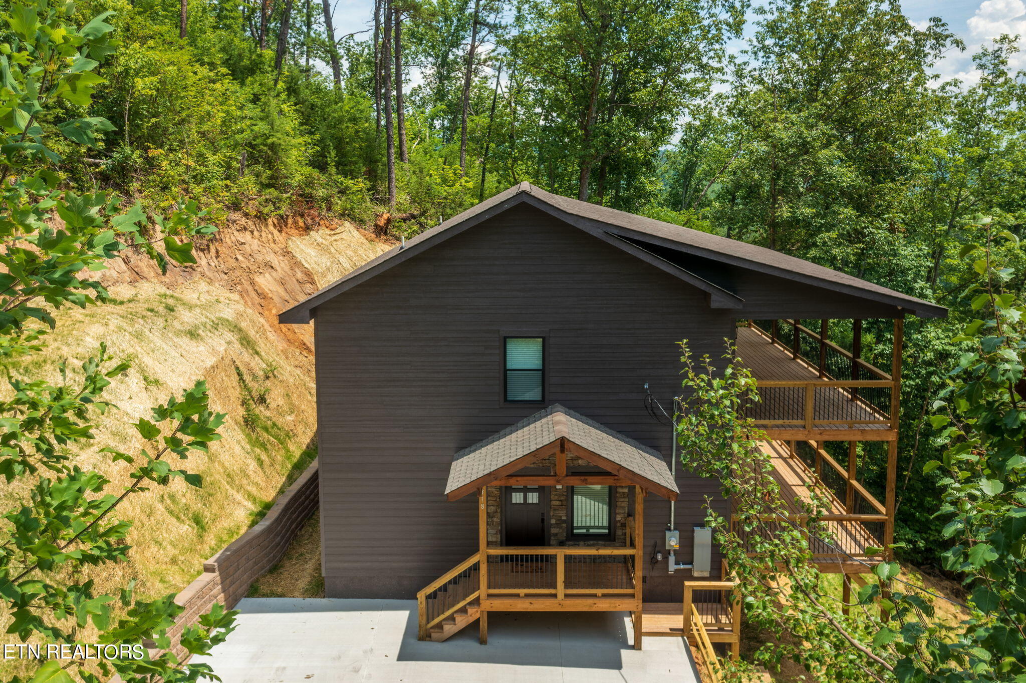 318 Greystone Heights Road Gatlinburg, TN 37738 - Photo 4 of 60 318 GSH Ext Entrance Drone 1