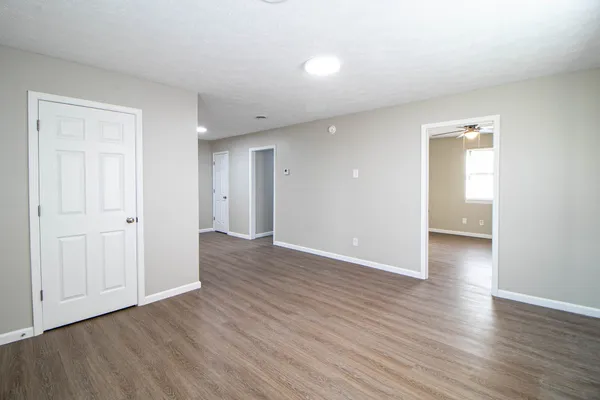 a view of a livingroom with wooden floor
