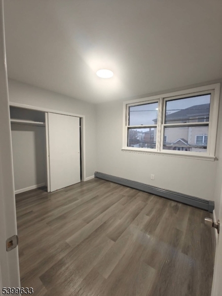 327 Christine Street, Unit 2L Elizabeth, NJ 07202 - Photo 8 of 11 a view of an empty room with a window