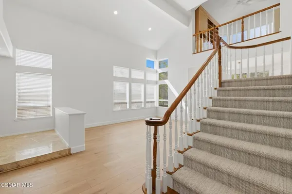 a view of hallway with stairs