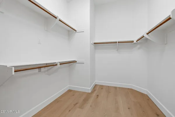 a view of a livingroom with wooden floor