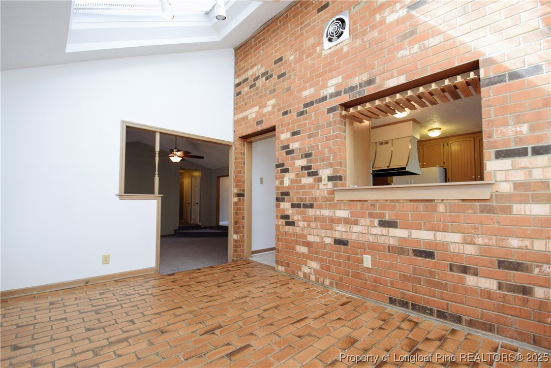 2347 Rolling Hill Road Fayetteville, NC 28304 - Photo 9 of 26 a view of a bathroom with a shower and a mirror