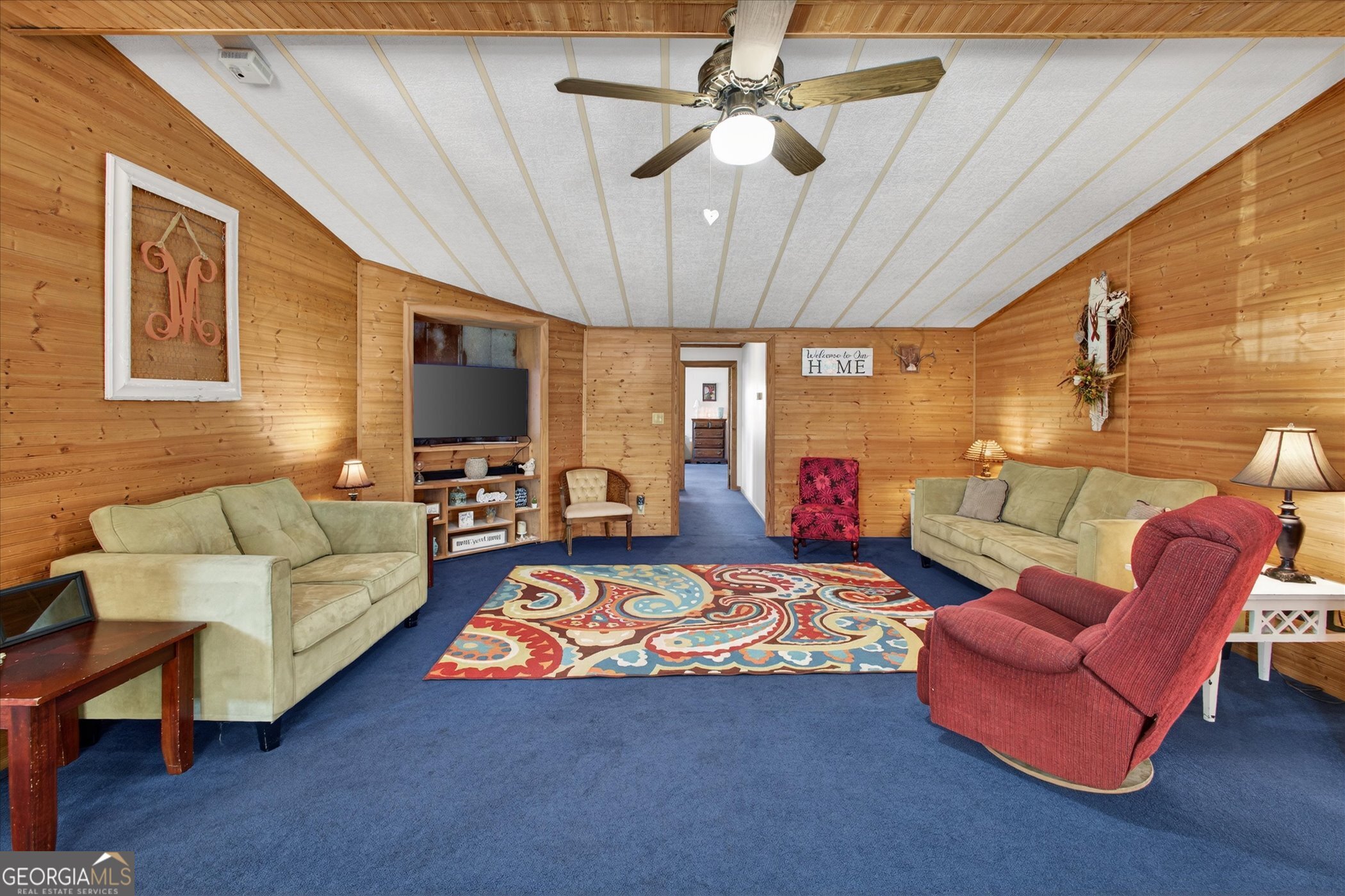395 Winchester Road Sylvania, GA 30467 - Photo 11 of 60 a living room with furniture and a flat screen tv