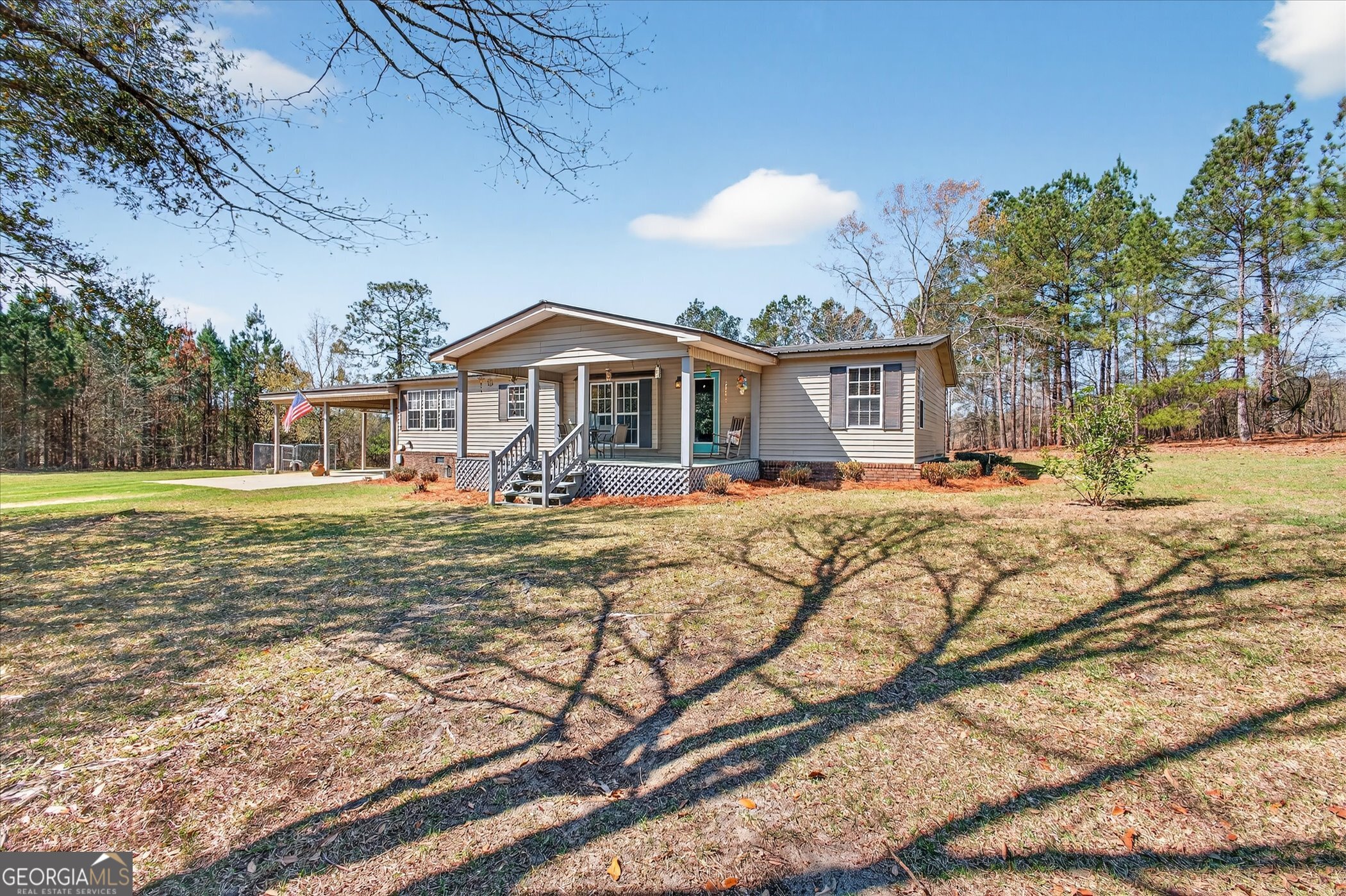 395 Winchester Road Sylvania, GA 30467 - Photo 2 of 60 a front view of a house with a yard