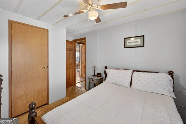 a room with a bed and a window