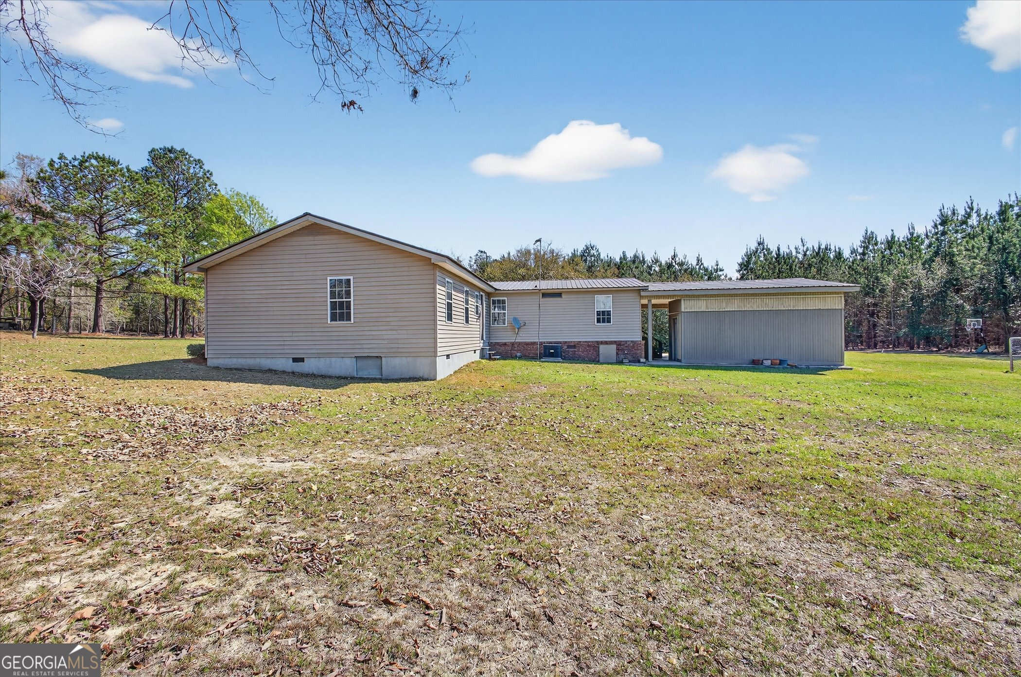 395 Winchester Road Sylvania, GA 30467 - Photo 45 of 60 a view of a house with a backyard