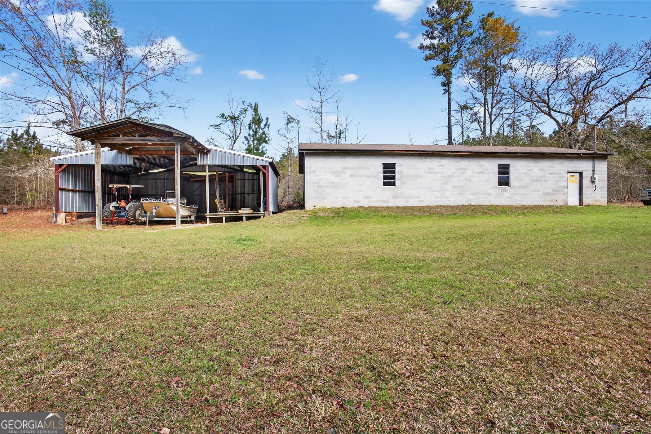 395 Winchester Road Sylvania, GA 30467 - Photo 47 of 60 a view of a house with a yard and sitting area