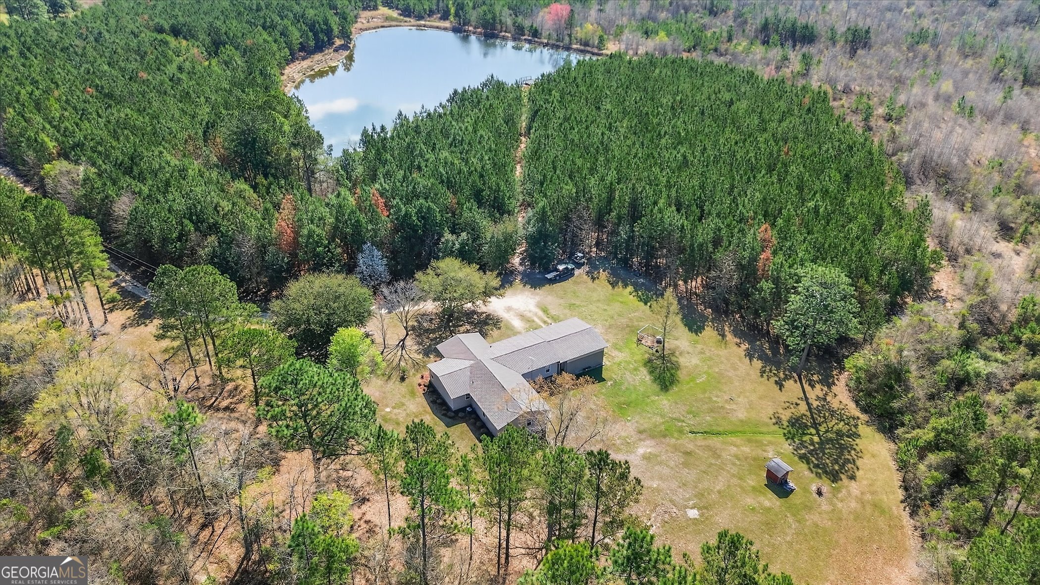 395 Winchester Road Sylvania, GA 30467 - Photo 53 of 60 an aerial view of a house with a yard