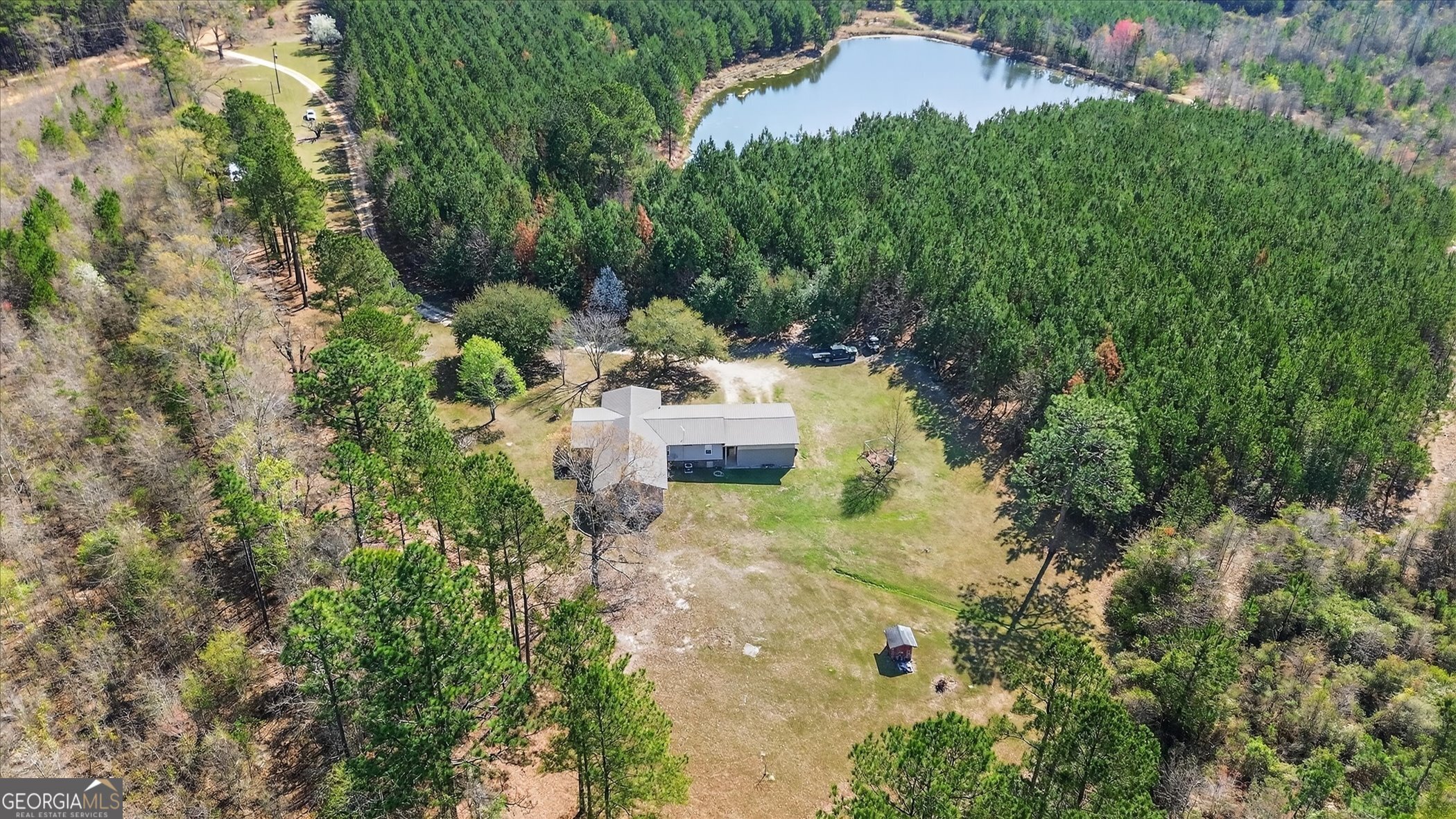 395 Winchester Road Sylvania, GA 30467 - Photo 54 of 60 an aerial view of a house with a yard