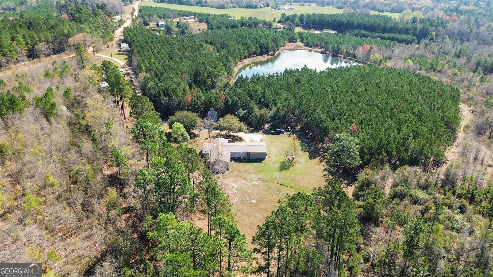395 Winchester Road Sylvania, GA 30467 - Photo 55 of 60 a view of a back yard of the house and green space