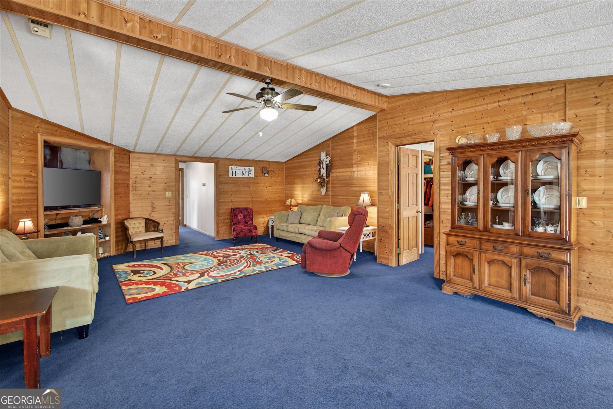 395 Winchester Road Sylvania, GA 30467 - Photo 7 of 60 a living room with furniture and a flat screen tv