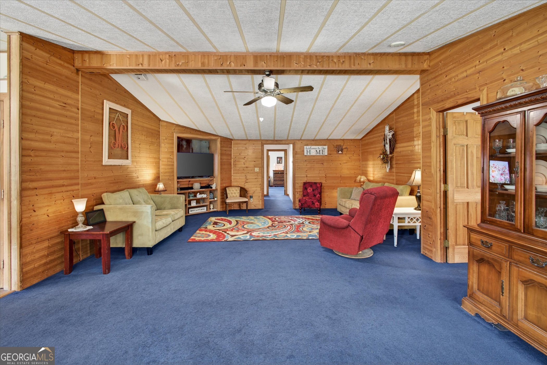 395 Winchester Road Sylvania, GA 30467 - Photo 8 of 60 a bedroom with furniture and a chandelier