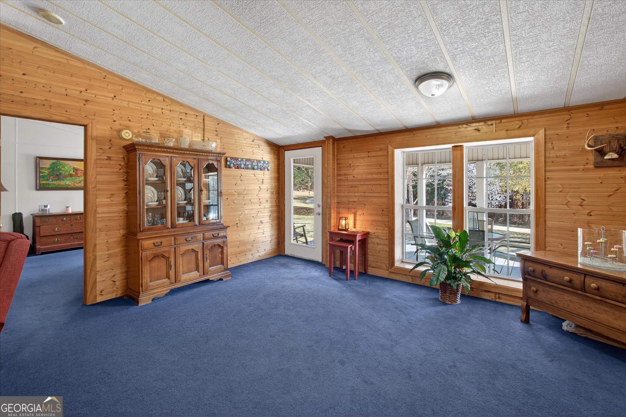 395 Winchester Road Sylvania, GA 30467 - Photo 10 of 60 a living room with furniture and large windows