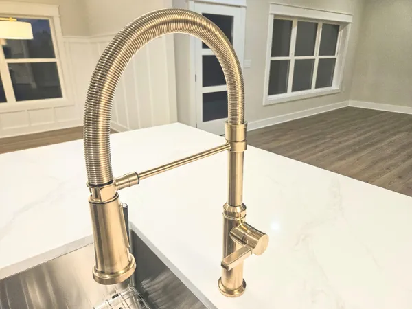 a view of a house with swimming pool and sitting area