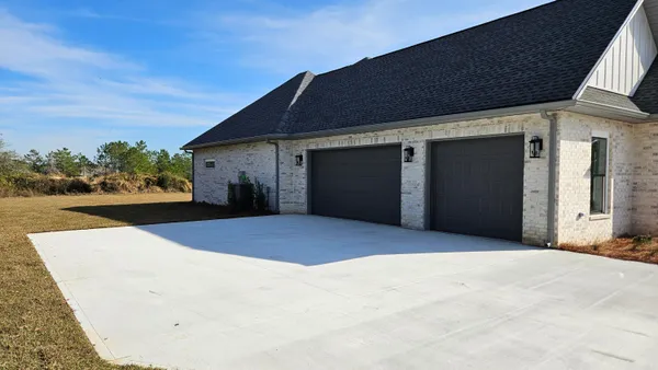 a stove top oven sitting inside of a kitchen