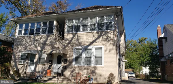 a view of a building with a street