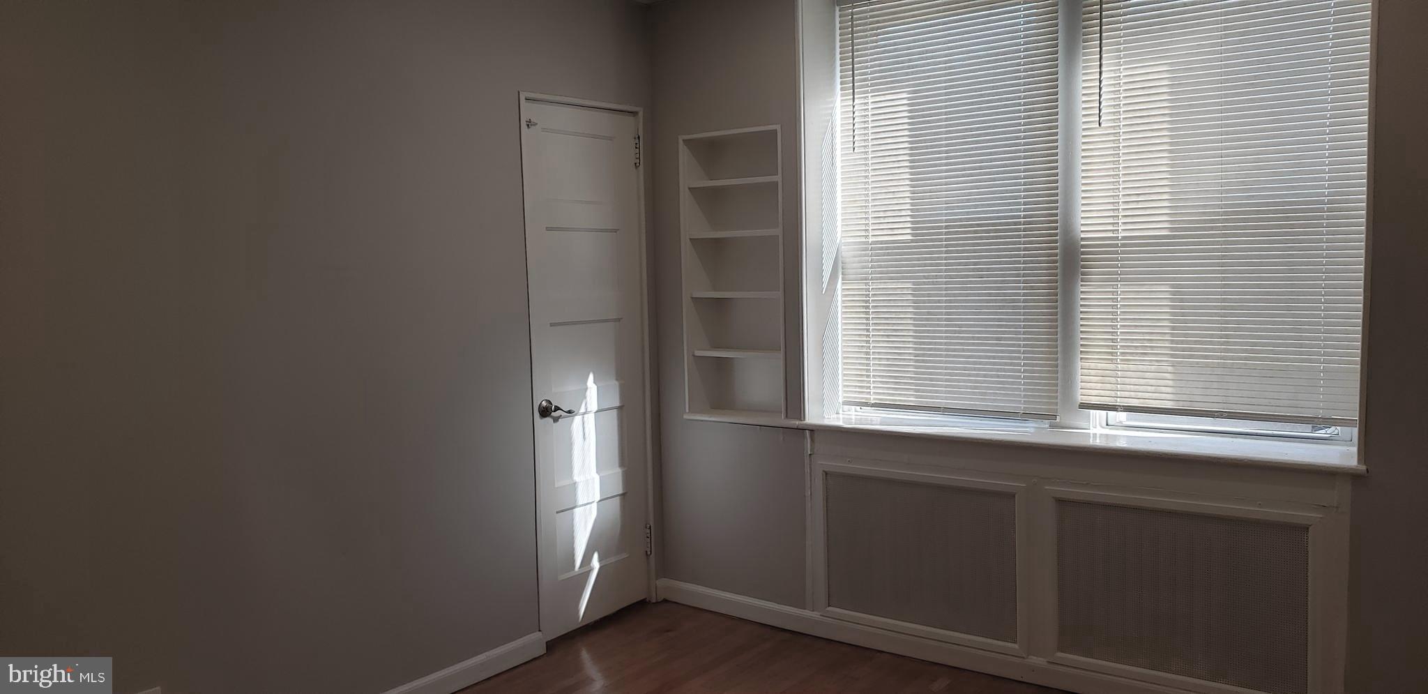 715 Collings Avenue, Unit A Oaklyn, NJ 08107 - Photo 16 of 22 a view of an empty room with a window