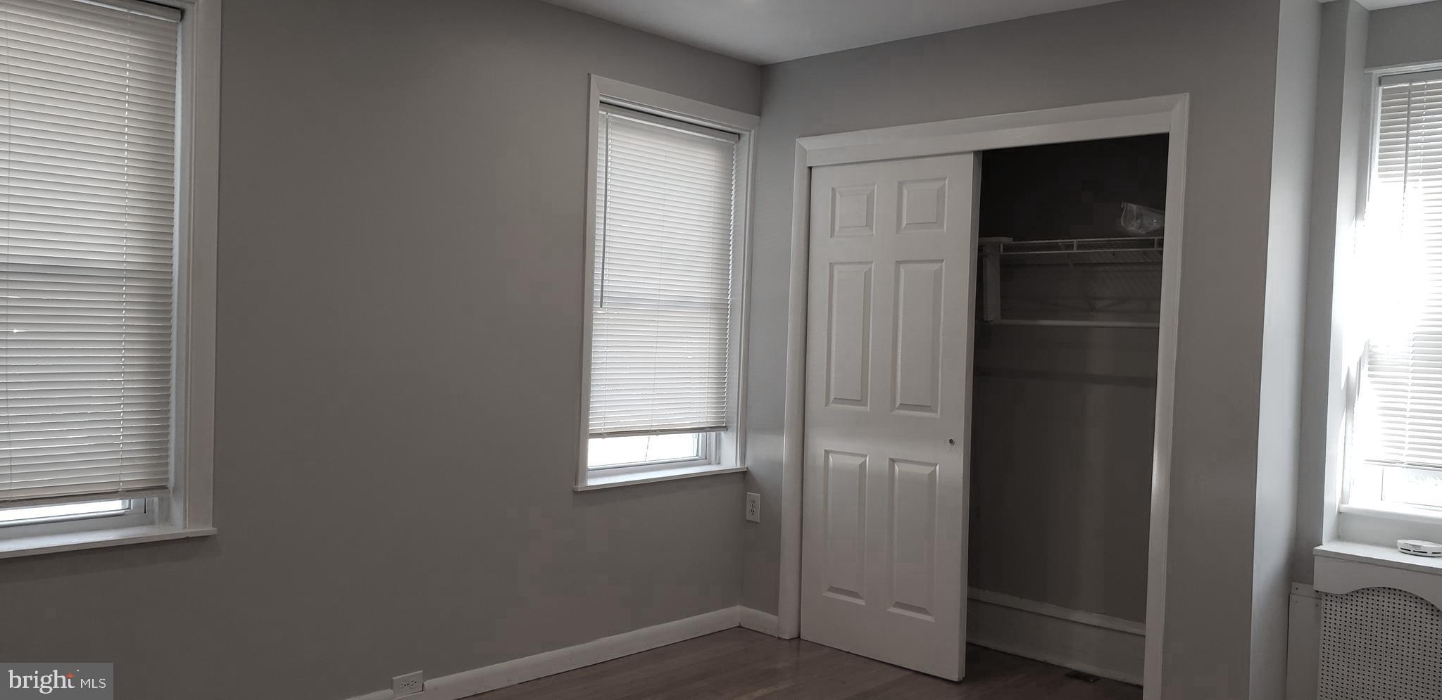 715 Collings Avenue, Unit A Oaklyn, NJ 08107 - Photo 17 of 22 a view of an empty room with windows and closet