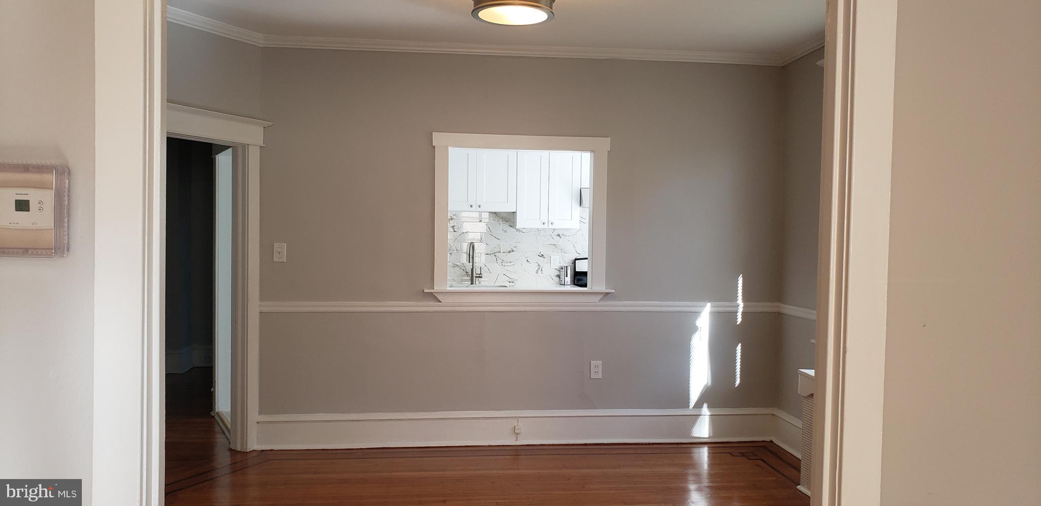 715 Collings Avenue, Unit A Oaklyn, NJ 08107 - Photo 4 of 22 a view of a window in a room