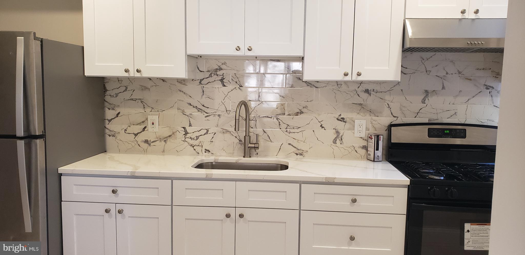 715 Collings Avenue, Unit A Oaklyn, NJ 08107 - Photo 7 of 22 a view of kitchen with stainless steel appliances