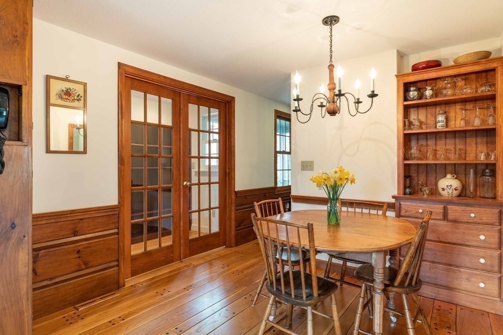 111 Audubon Road Northampton, MA 01053 - Photo 14 of 39 a view of a dining room with furniture window and wooden floor