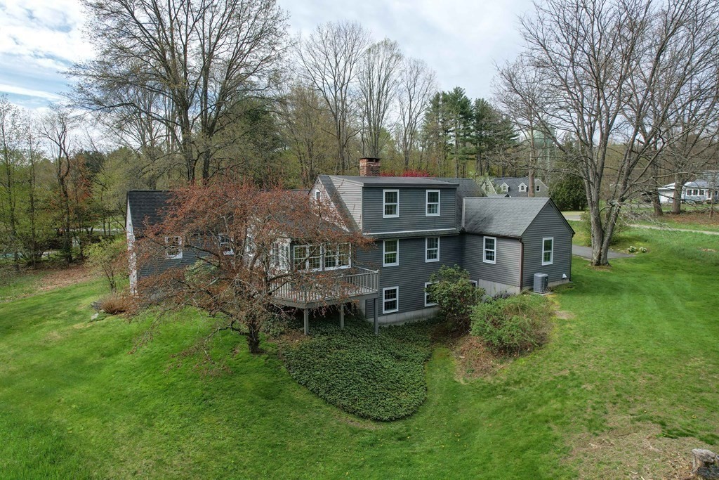 111 Audubon Road Northampton, MA 01053 - Photo 2 of 39 a view of a house with a backyard and a trees