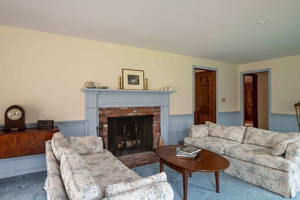 111 Audubon Road Northampton, MA 01053 - Photo 21 of 39 a living room with furniture and a fireplace