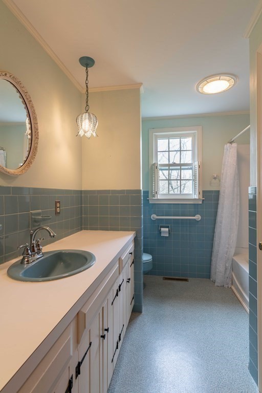 111 Audubon Road Northampton, MA 01053 - Photo 24 of 39 a bathroom with double vanity sink and a mirror