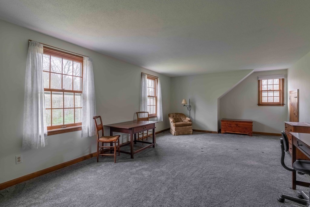 111 Audubon Road Northampton, MA 01053 - Photo 28 of 39 an empty room with windows and a table