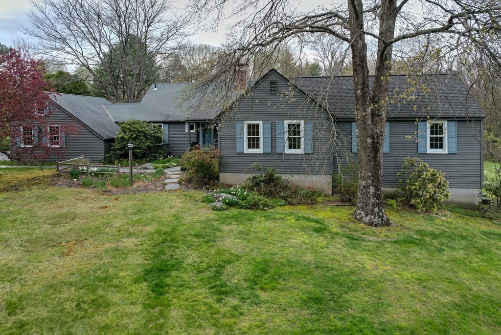 111 Audubon Road Northampton, MA 01053 - Photo 36 of 39 a backyard of a house with plants and large tree