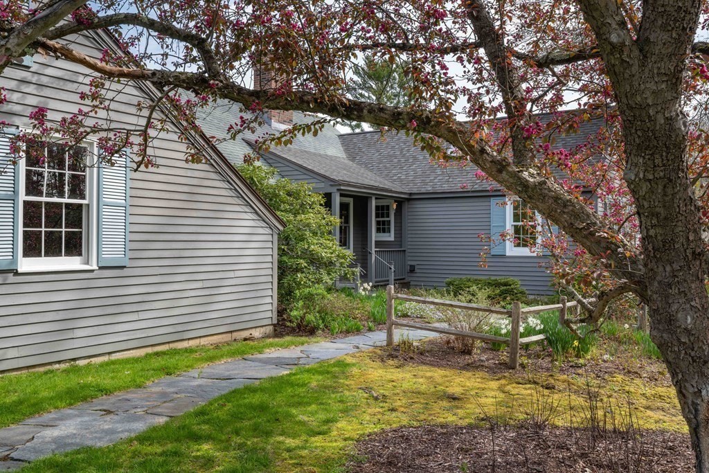 111 Audubon Road Northampton, MA 01053 - Photo 38 of 39 a backyard of a house with yard and outdoor seating