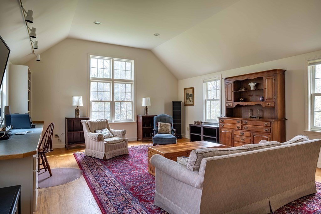 111 Audubon Road Northampton, MA 01053 - Photo 8 of 39 a living room with furniture and a flat screen tv