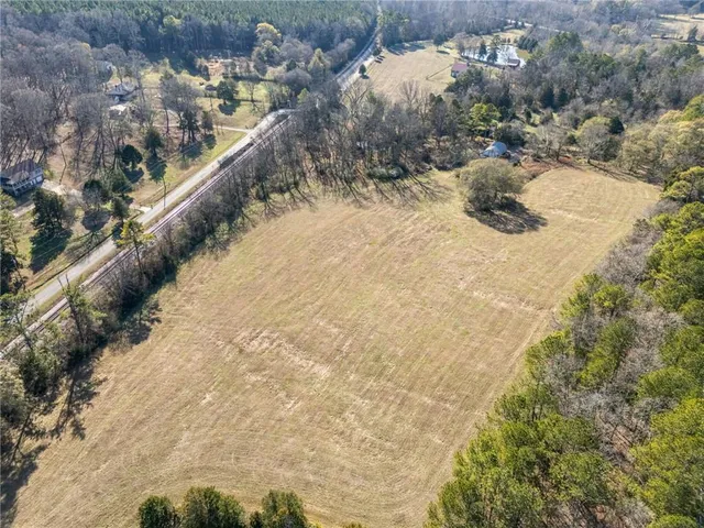 a view of a dry yard with wooden floor