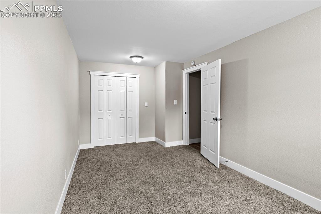738 Harrison Place Colorado Springs, CO 80905 - Photo 8 of 25 a view of an empty room