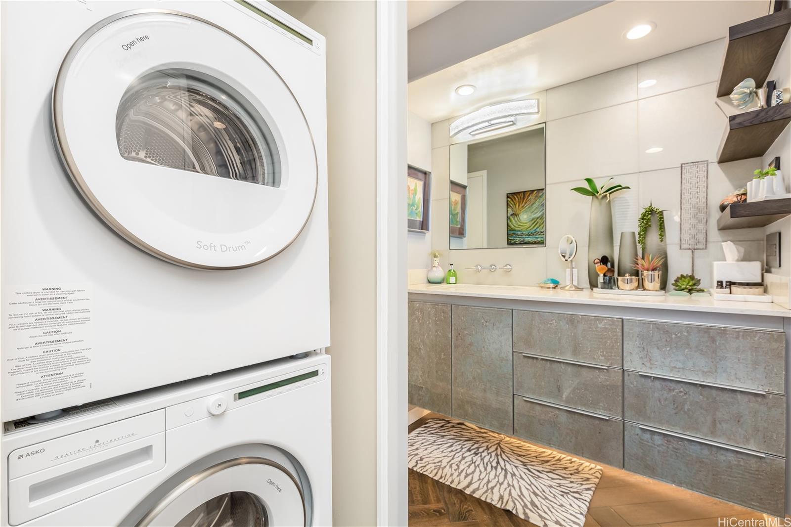 1212 Nuuanu Avenue, Unit 3411 Honolulu, HI 96817 - Photo 17 of 24 a bathroom with a sink and a mirror