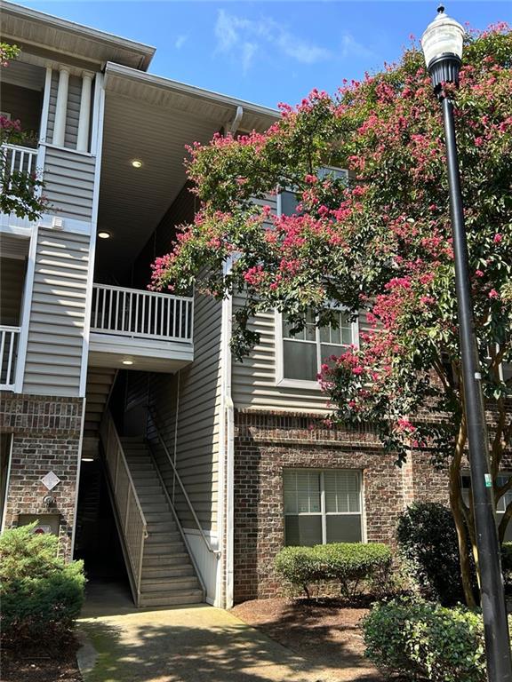 2700 Pine Tree Road Northeast, Unit 1318 Atlanta, GA 30324 - Photo 1 of 1 a front view of a house