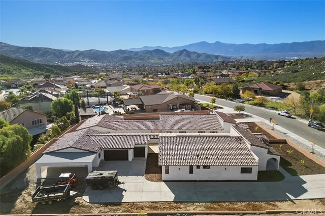 a view of a house with a mountain