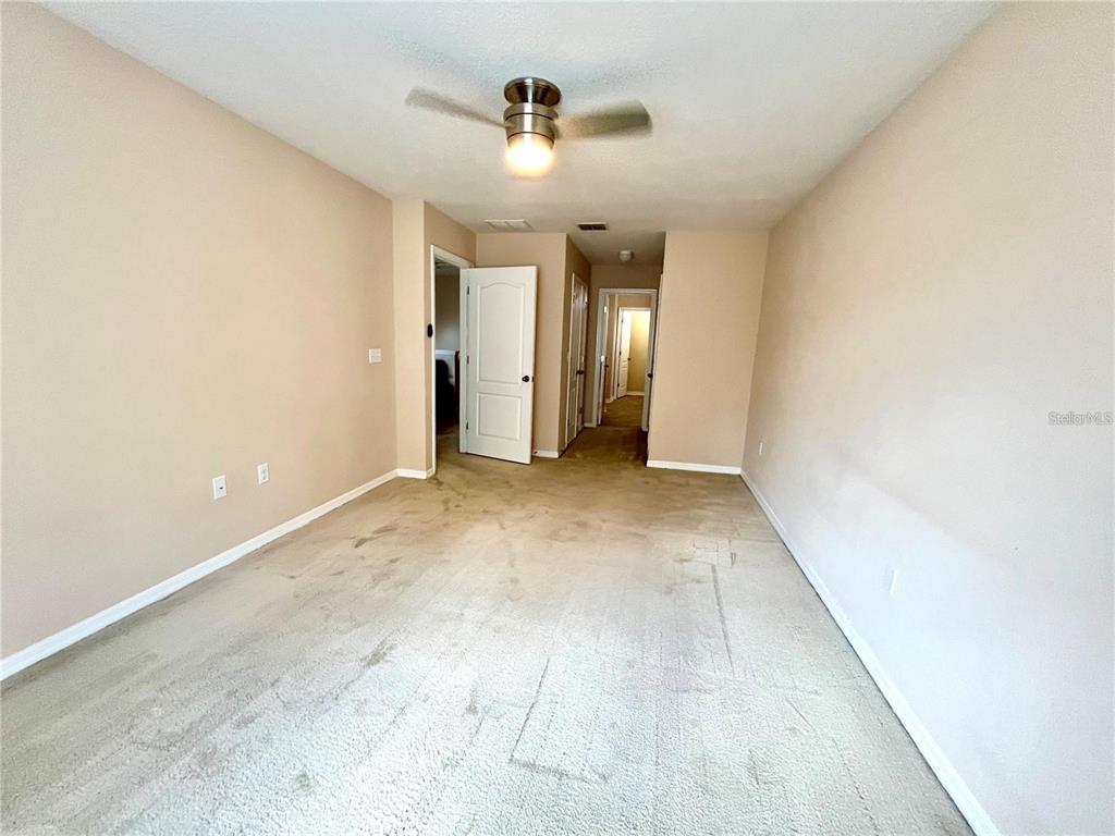 5552 Rutherford Place Oviedo, FL 32765 - Photo 12 of 20 a view of an empty room with a window